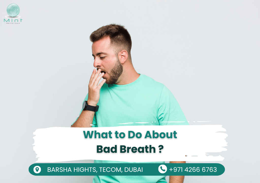 Dentist performing a comprehensive oral examination for bad breath causes, checking teeth, gums, and tongue health.