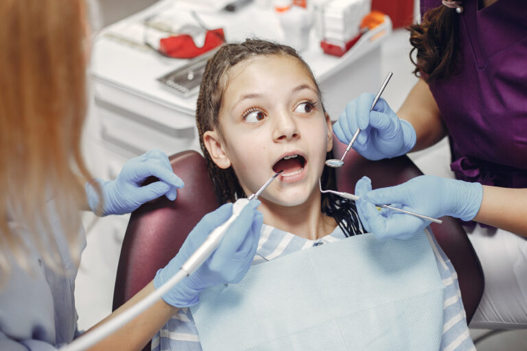 Child being assessed for tongue tie treatment at Mint Dental Care