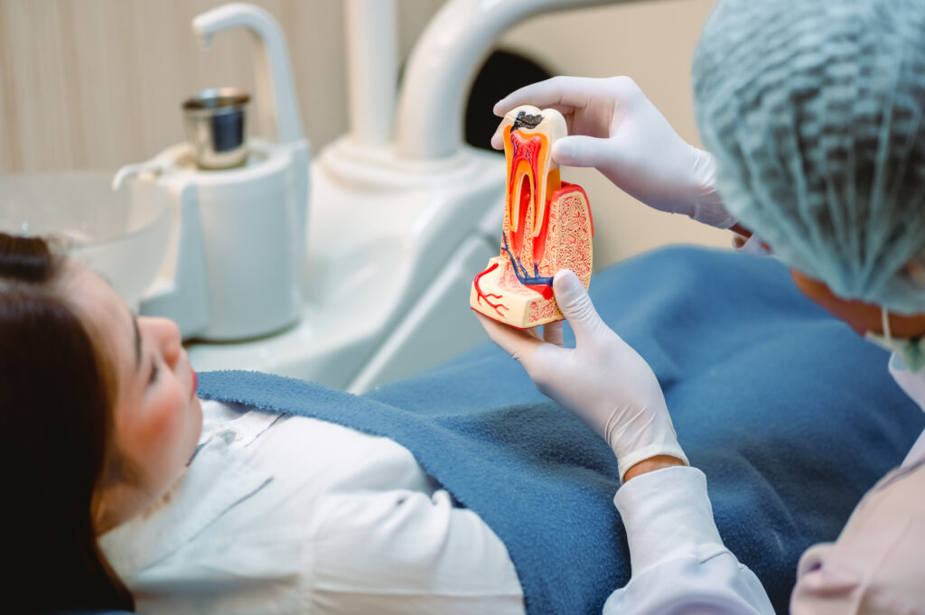 Dentist explaining All-on-6 bone grafting in Dubai